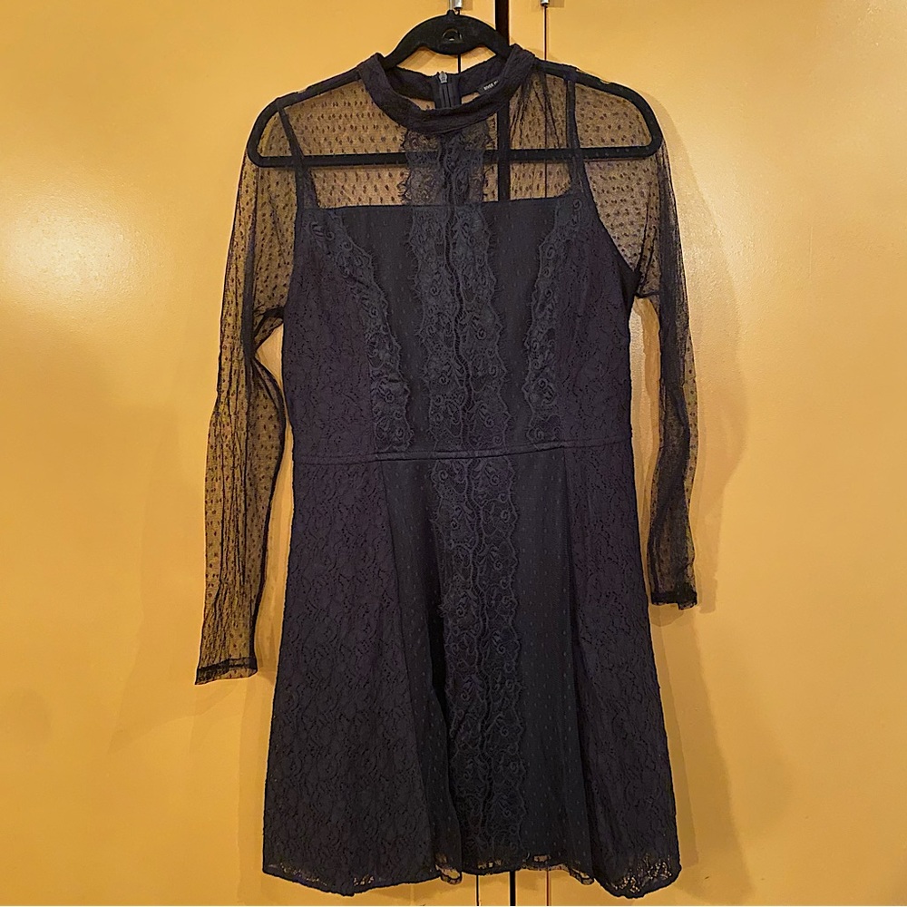 River Island brand black lace high neck long sleeved mini dress. Size 10 US.
